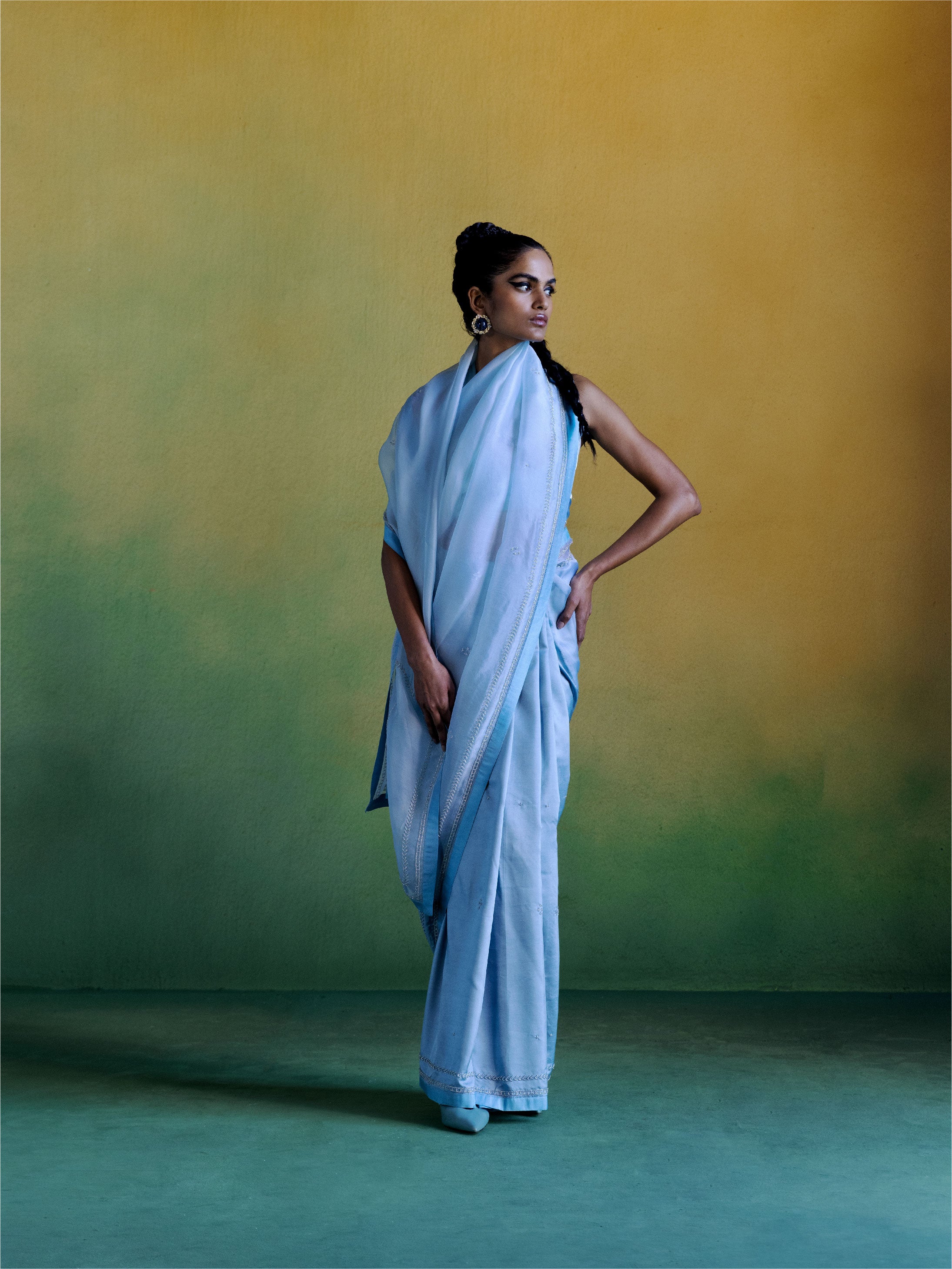 Sari with standing pose Stock Photos - Page 1 : Masterfile